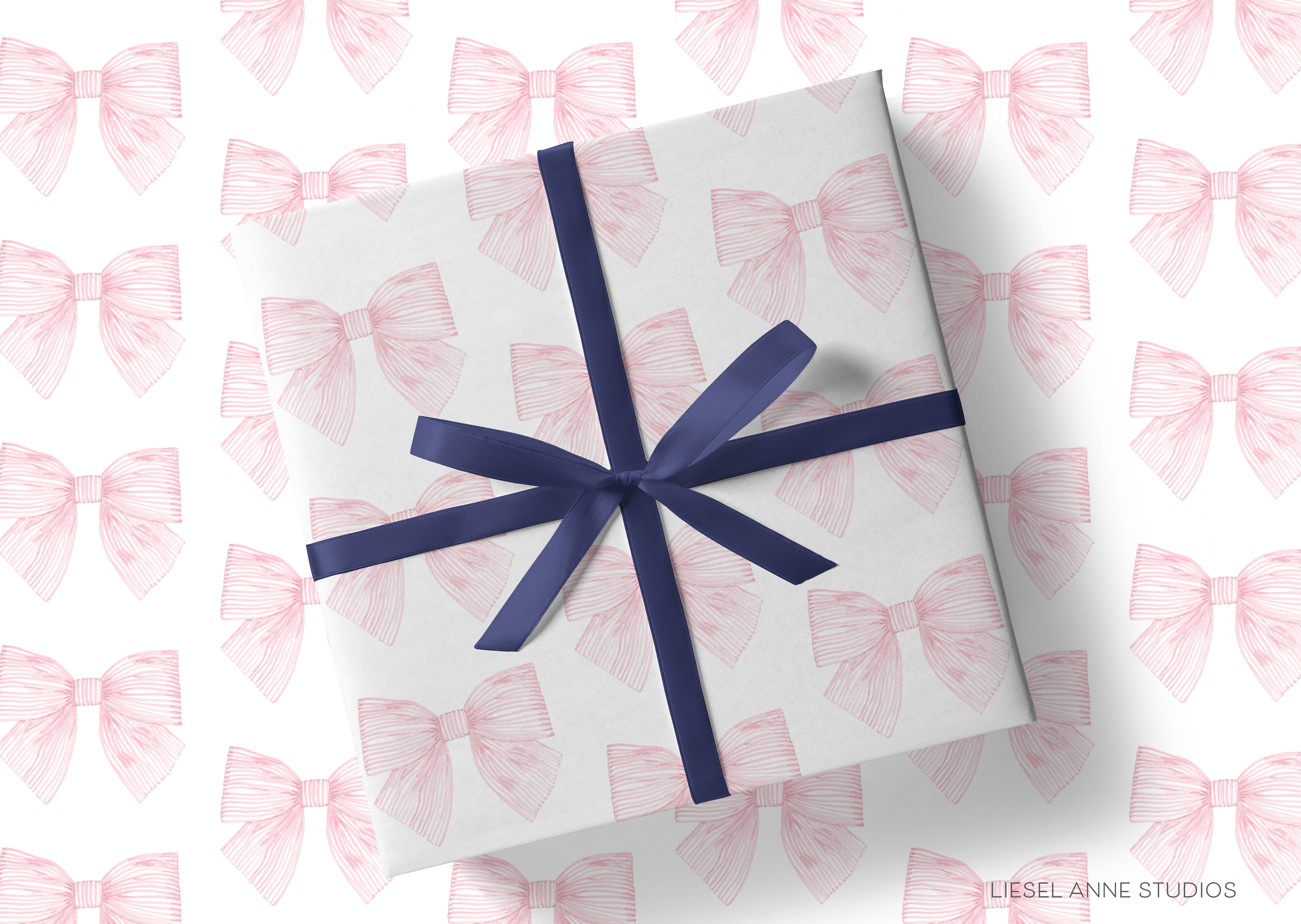 a gift wrapped in white paper with a blue ribbon, and the background has a repeating pattern of pink bows.