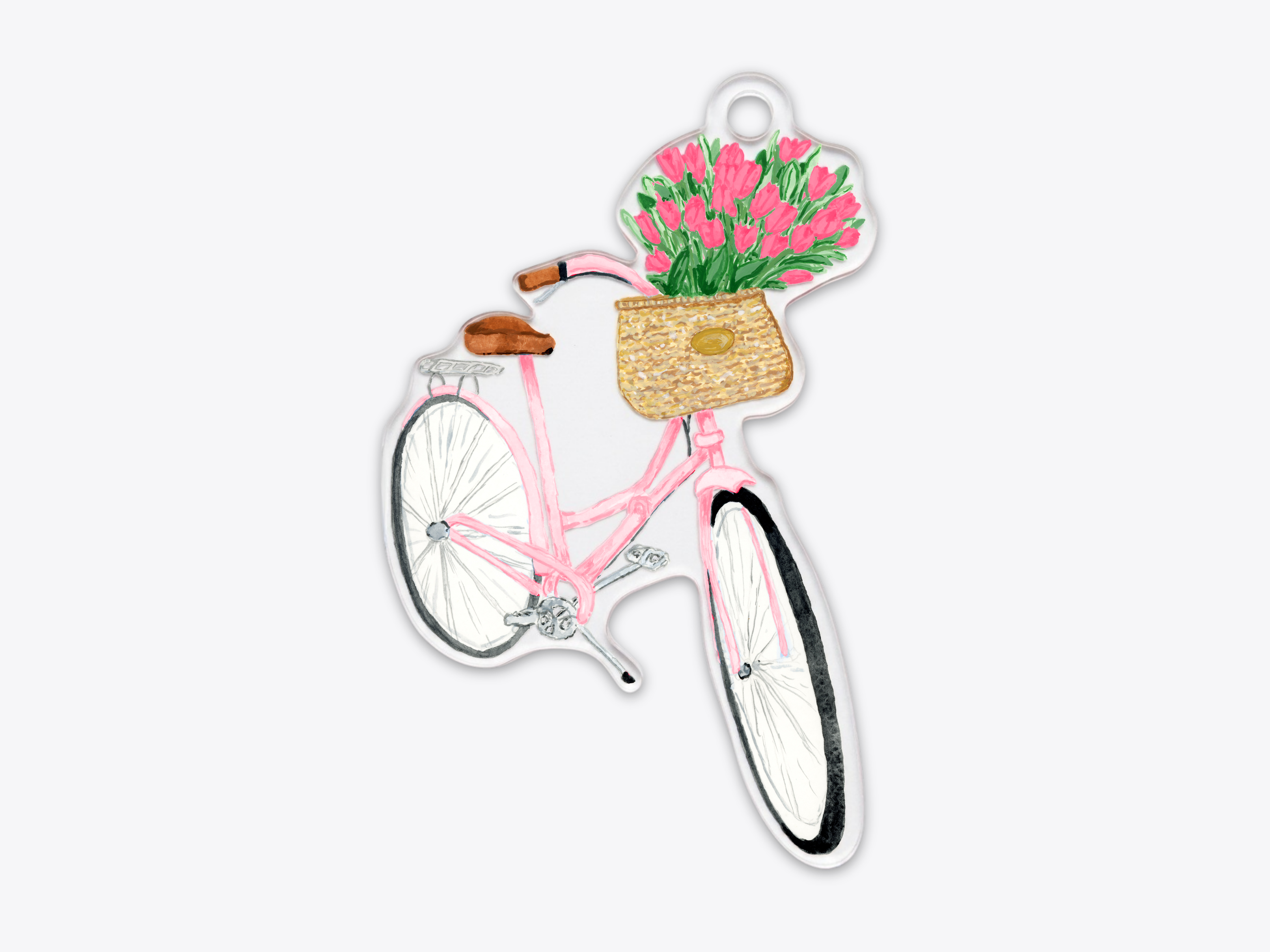 A pink bicycle with a basket filled with pink flowers.