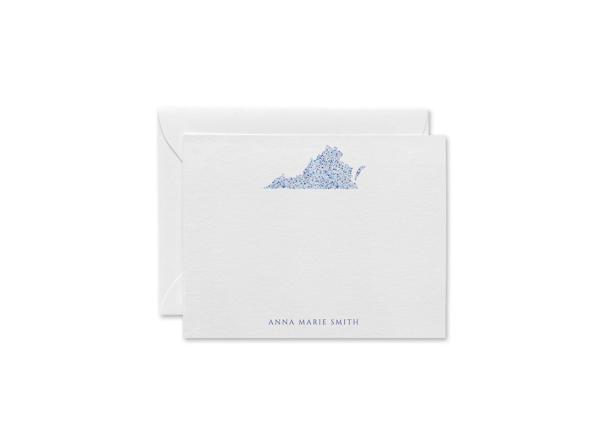 The image is a white card with a blue design of a state map on it, and the name 'ANNA MARIE SMITH' is printed below the map.
