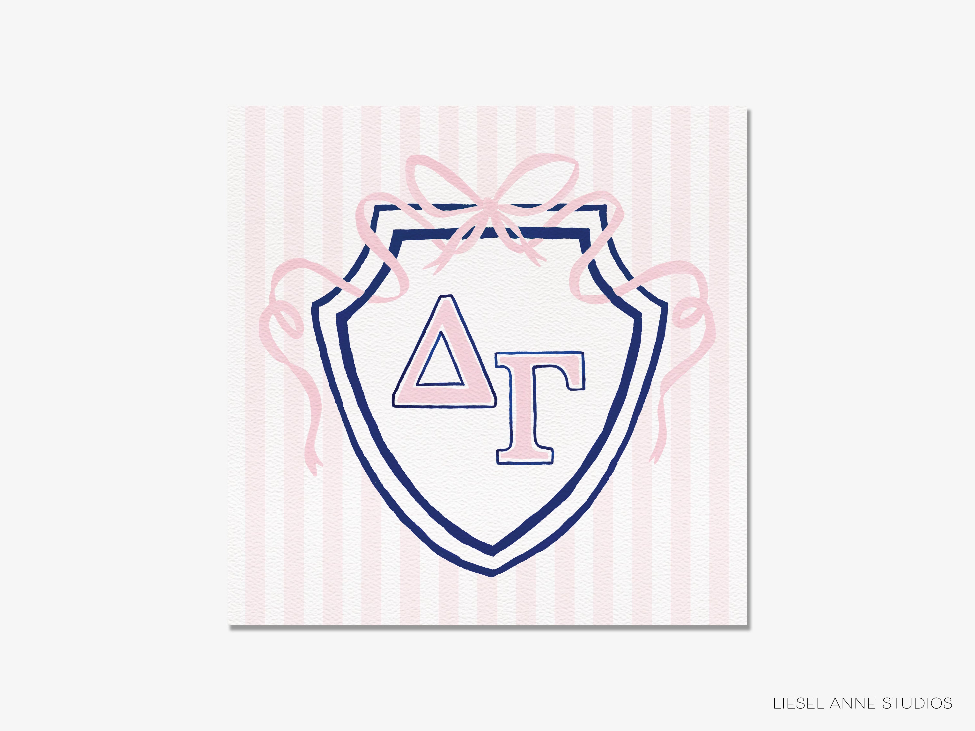 a shield-shaped logo with the letters 'ΔΛΙ' (Delta Delta Sigma Theta) in the center, surrounded by pink ribbons.