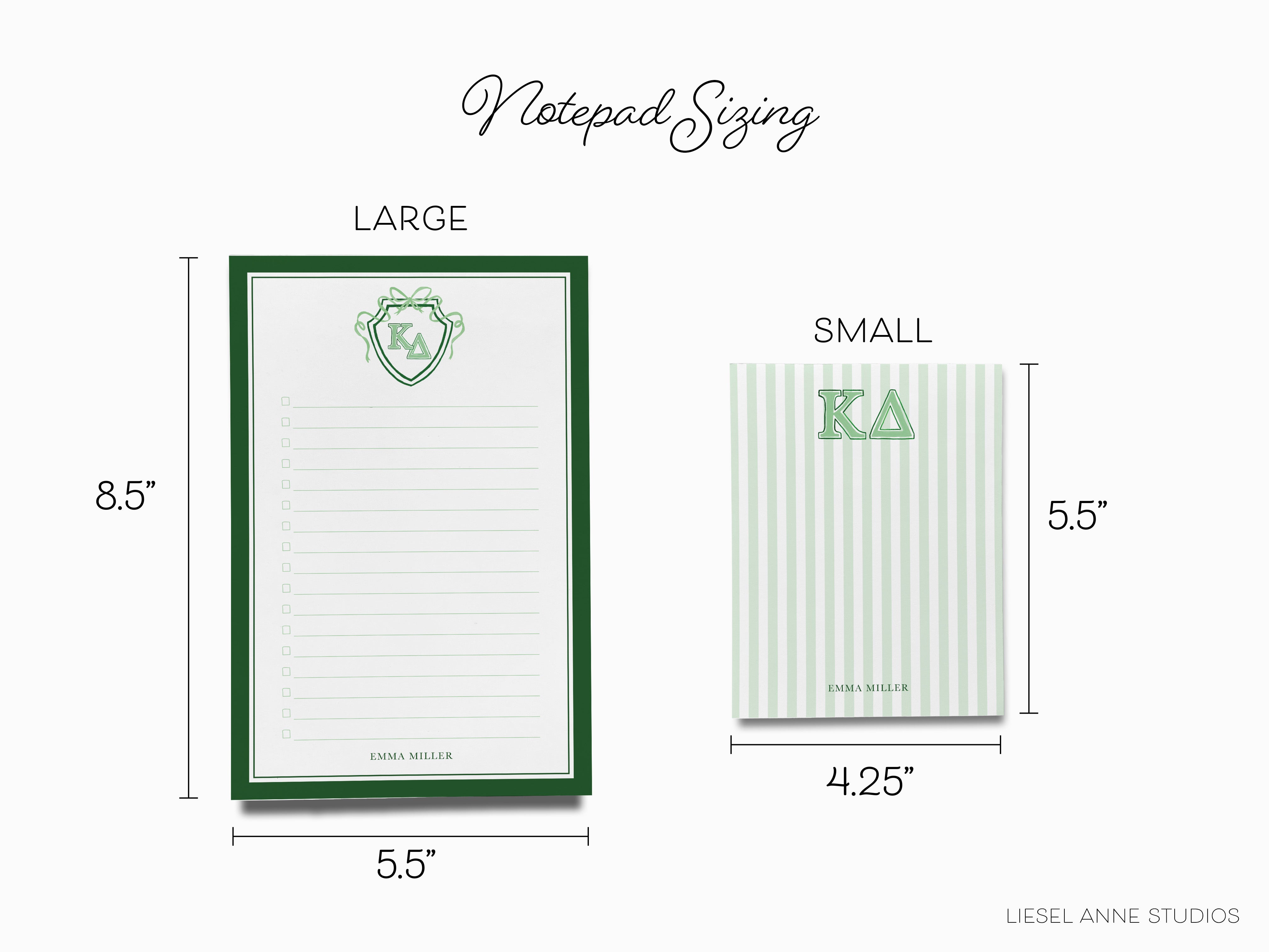 a notepad with a green border and a small notepad with a green border