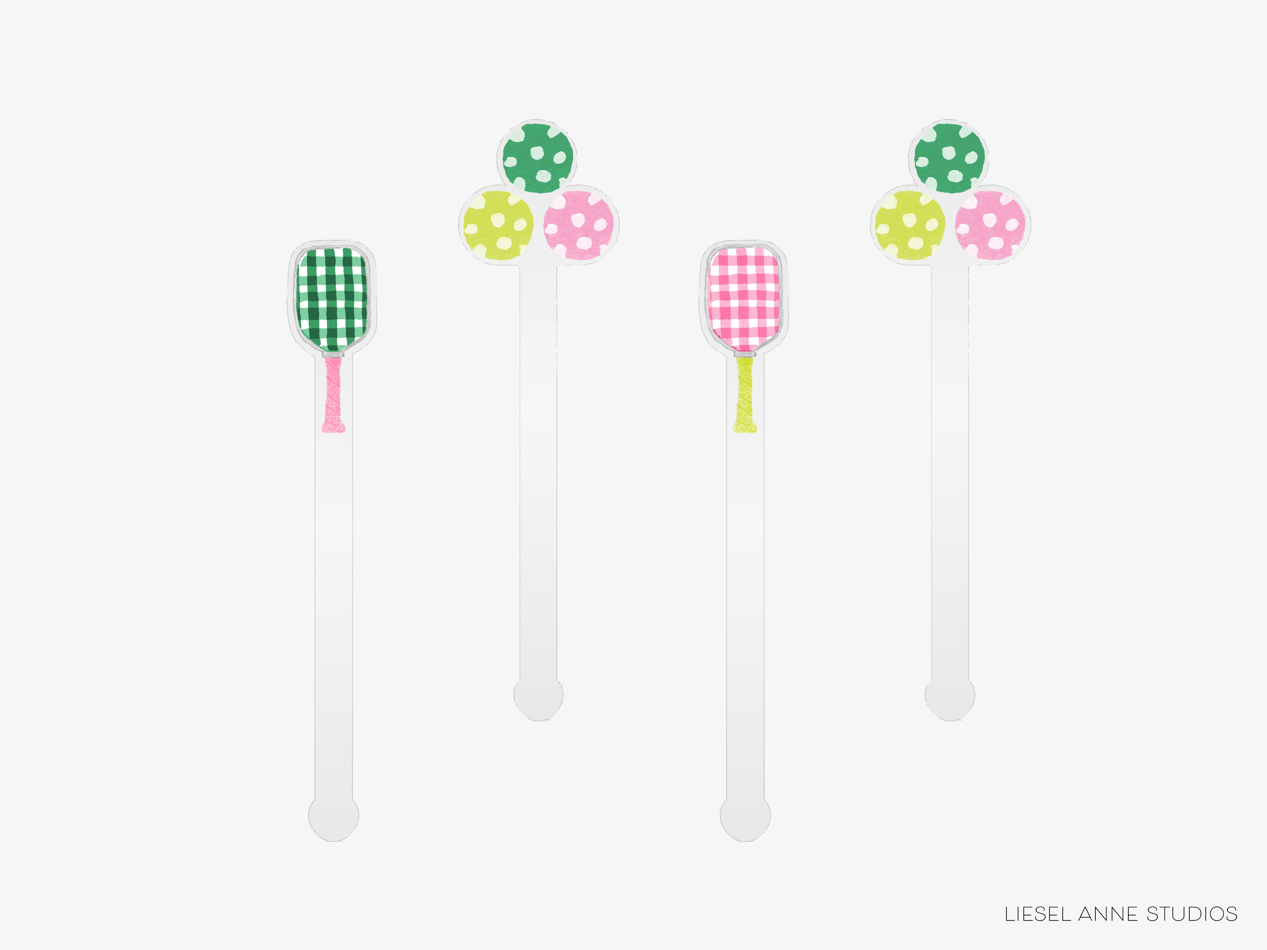 four toothbrushes with polka dot designs on them.