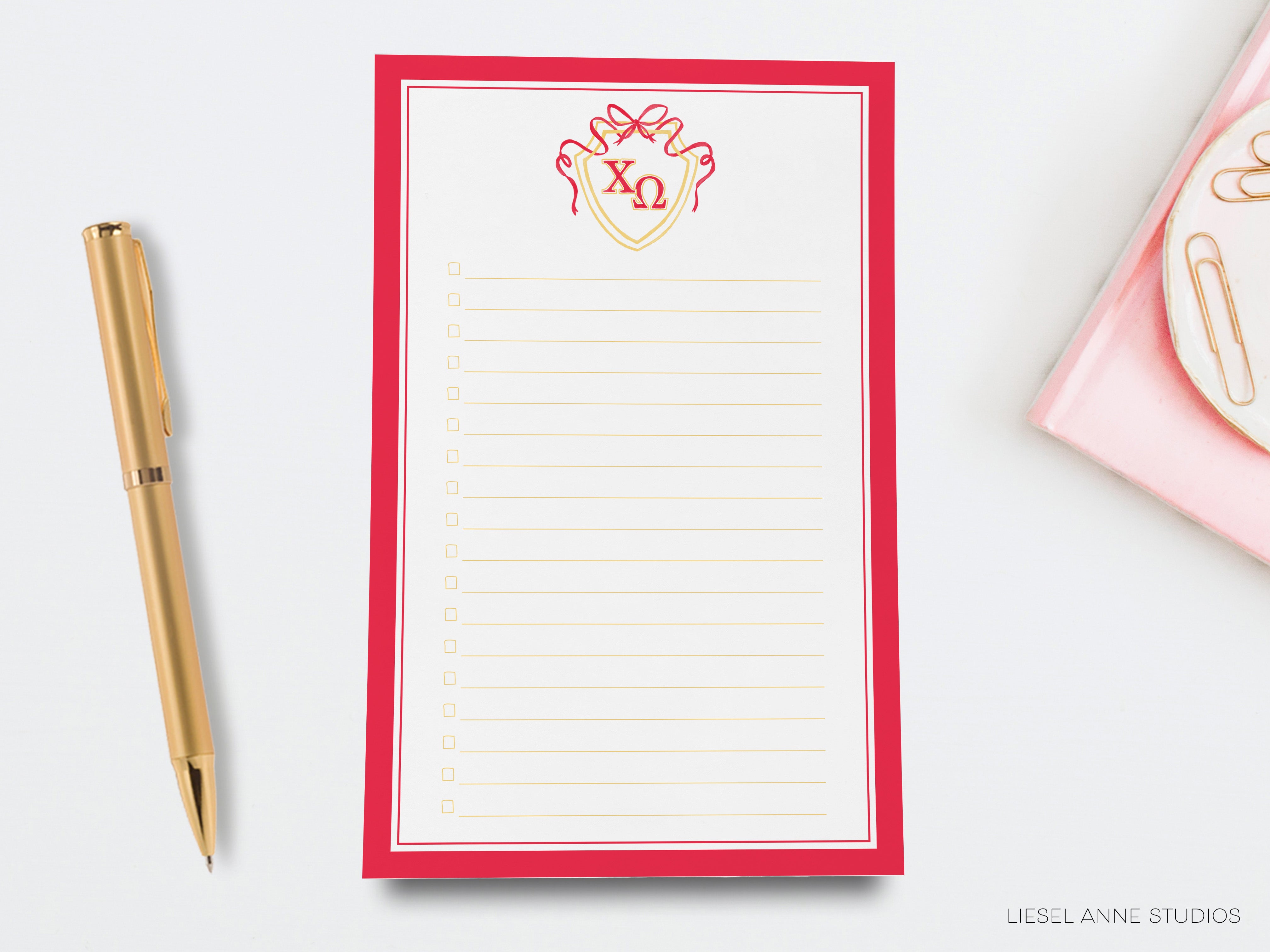 a notepad with a pen and a pen on top of it