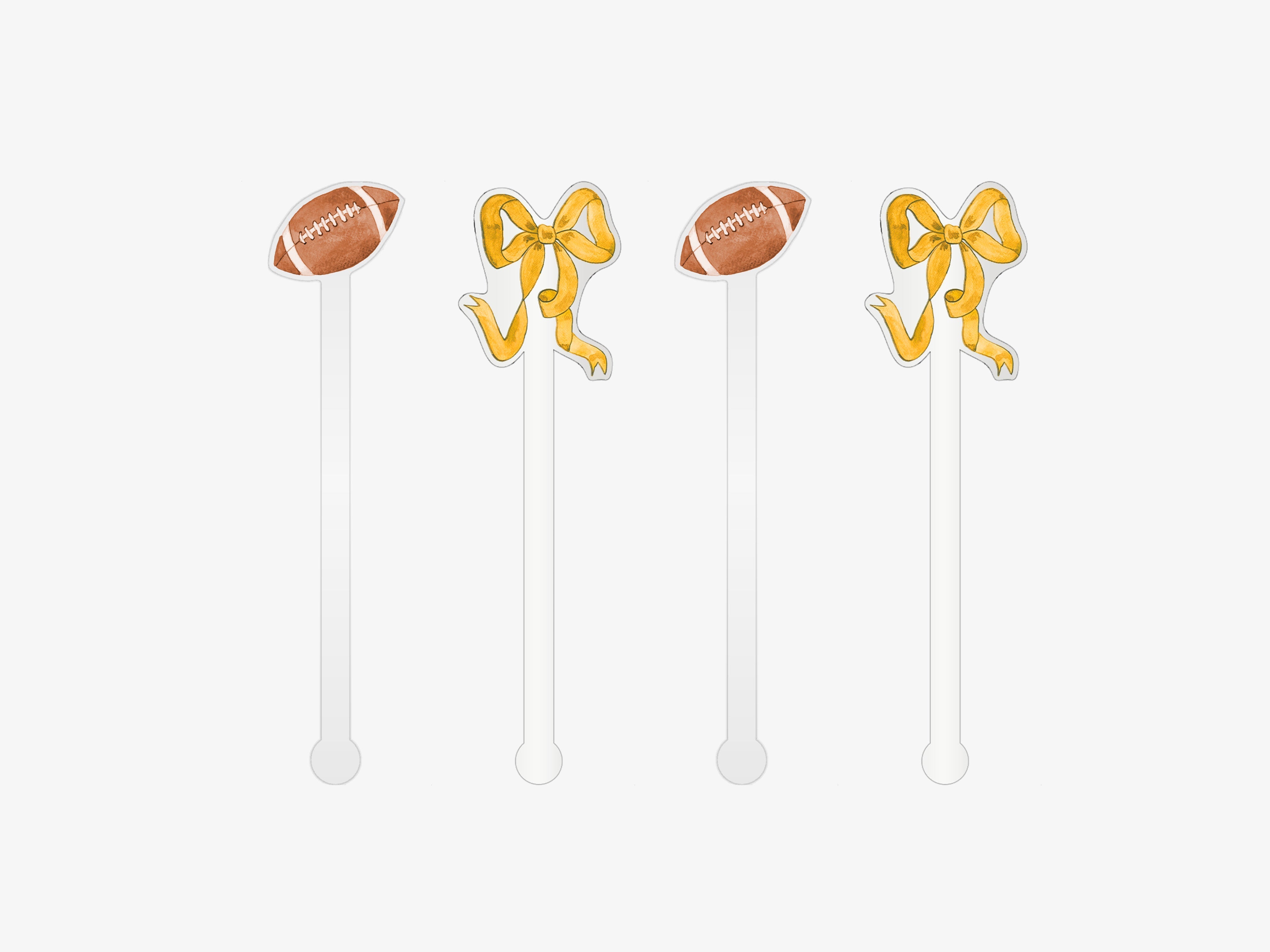 four white straws with football-themed decorations on them.