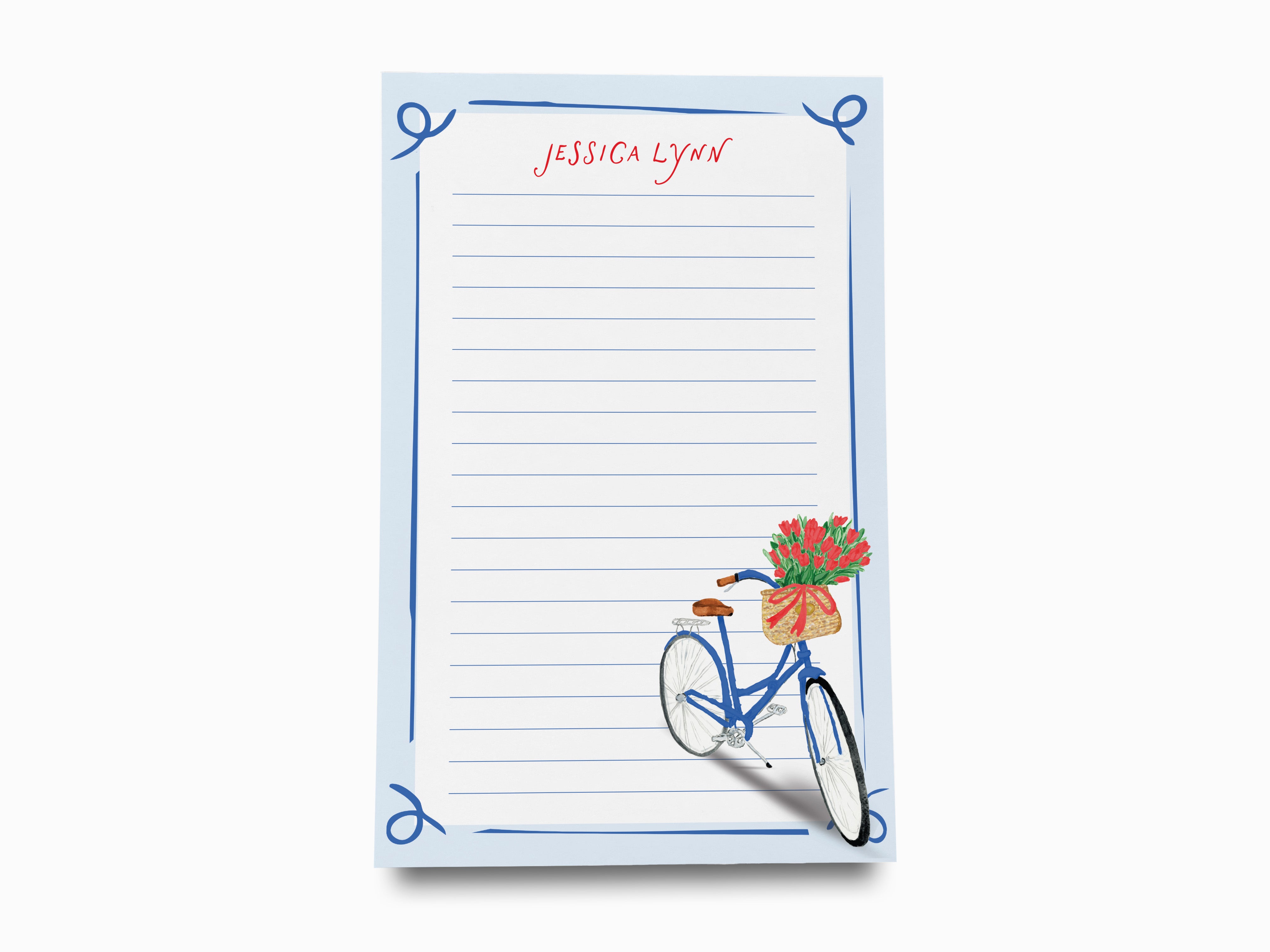 a blue bicycle with a basket of flowers on the handlebars, set against a white background with a blue border.