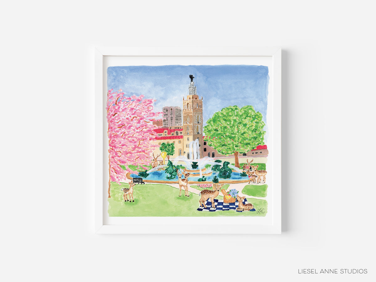 A framed illustration depicting a park scene with a tall tower, pink blossoms, and people enjoying the outdoors.