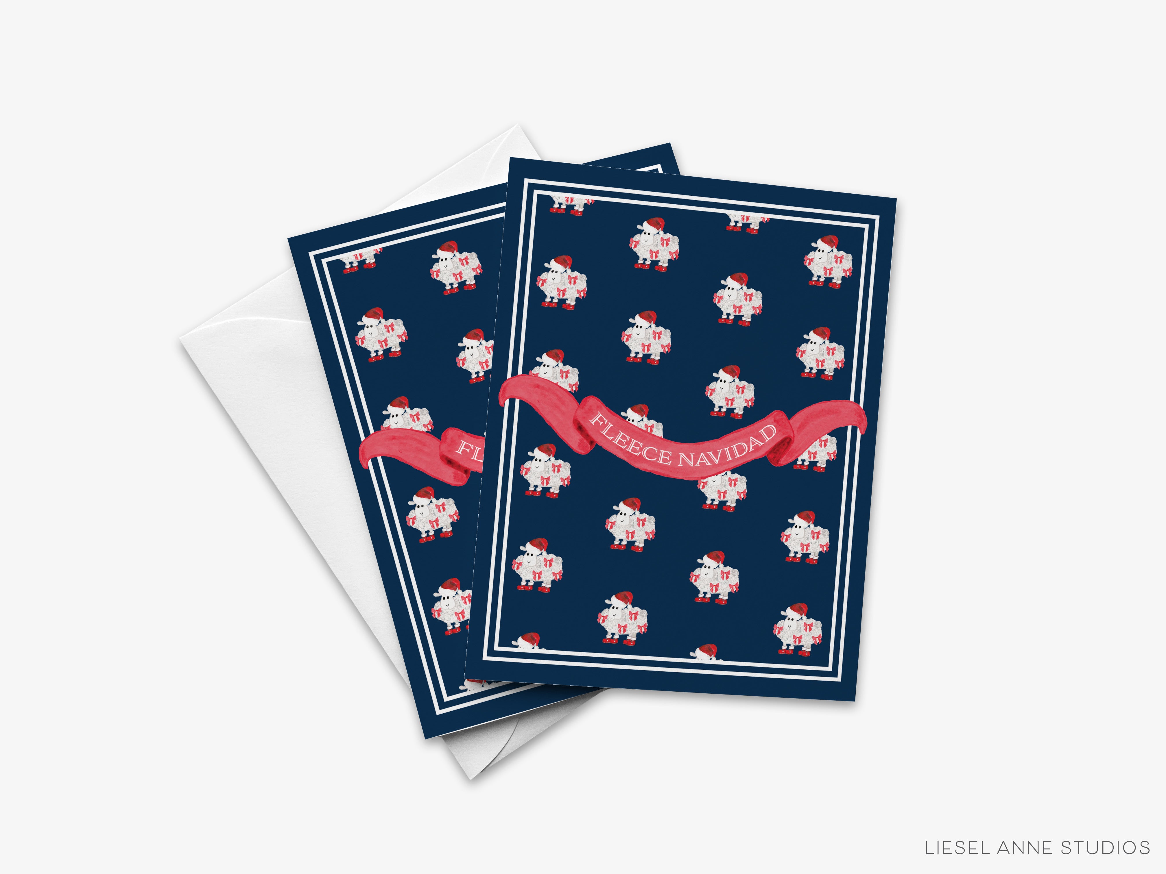 A pair of greeting cards with a navy blue background and a repeating pattern of red and white sheep. The text on the cards reads "Bless your loved ones" and "Happy Christmas".