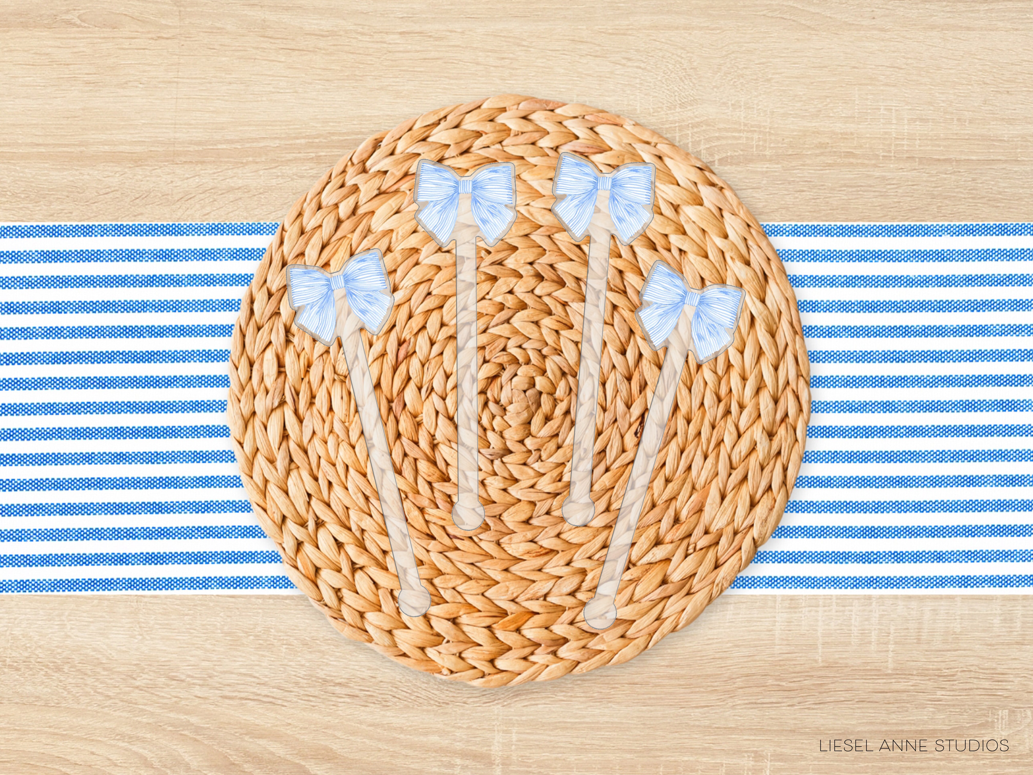 a woven placemat with blue and white striped elements, and there are four blue bows on the placemat.