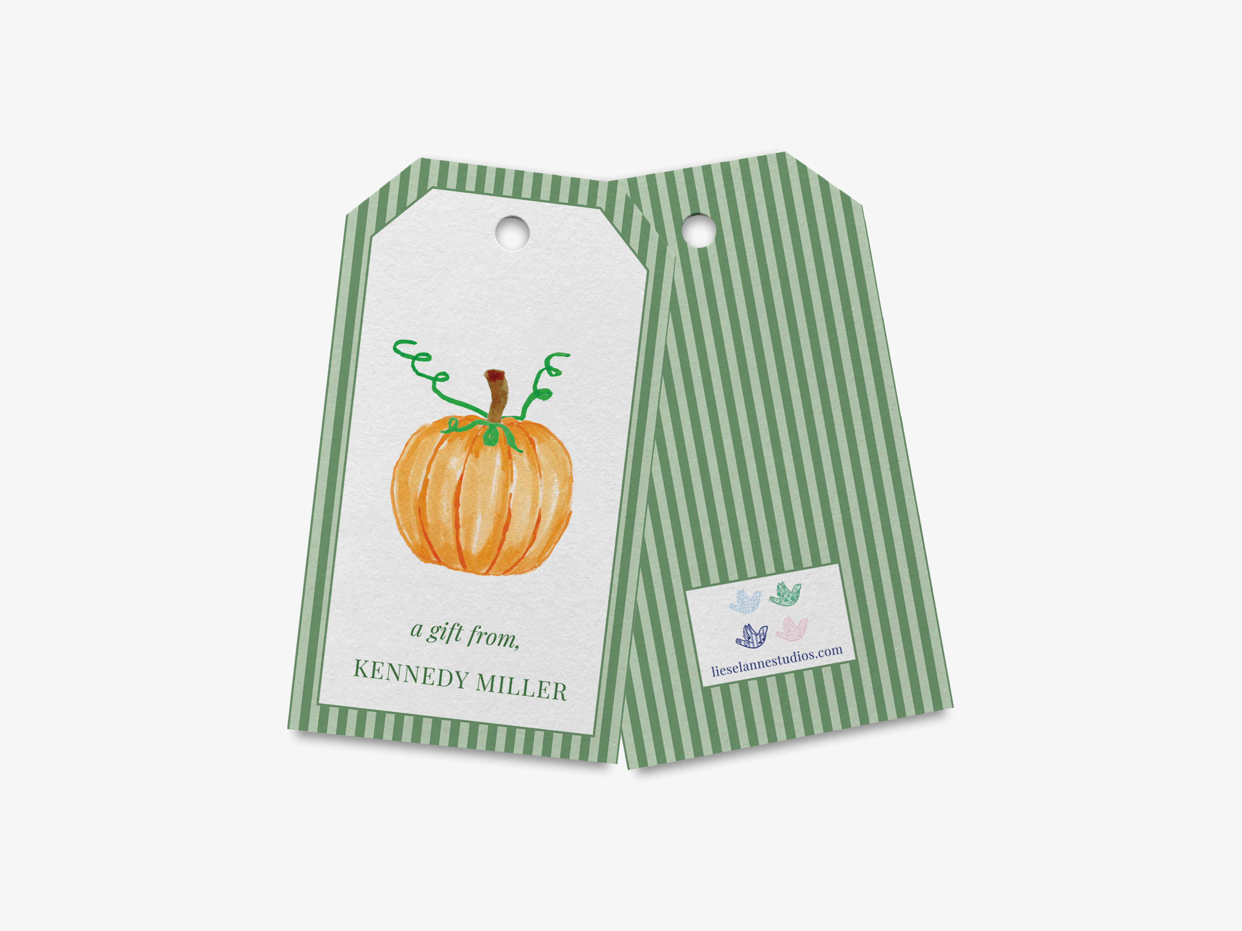 a green and white striped gift tag with a pumpkin illustration on it.