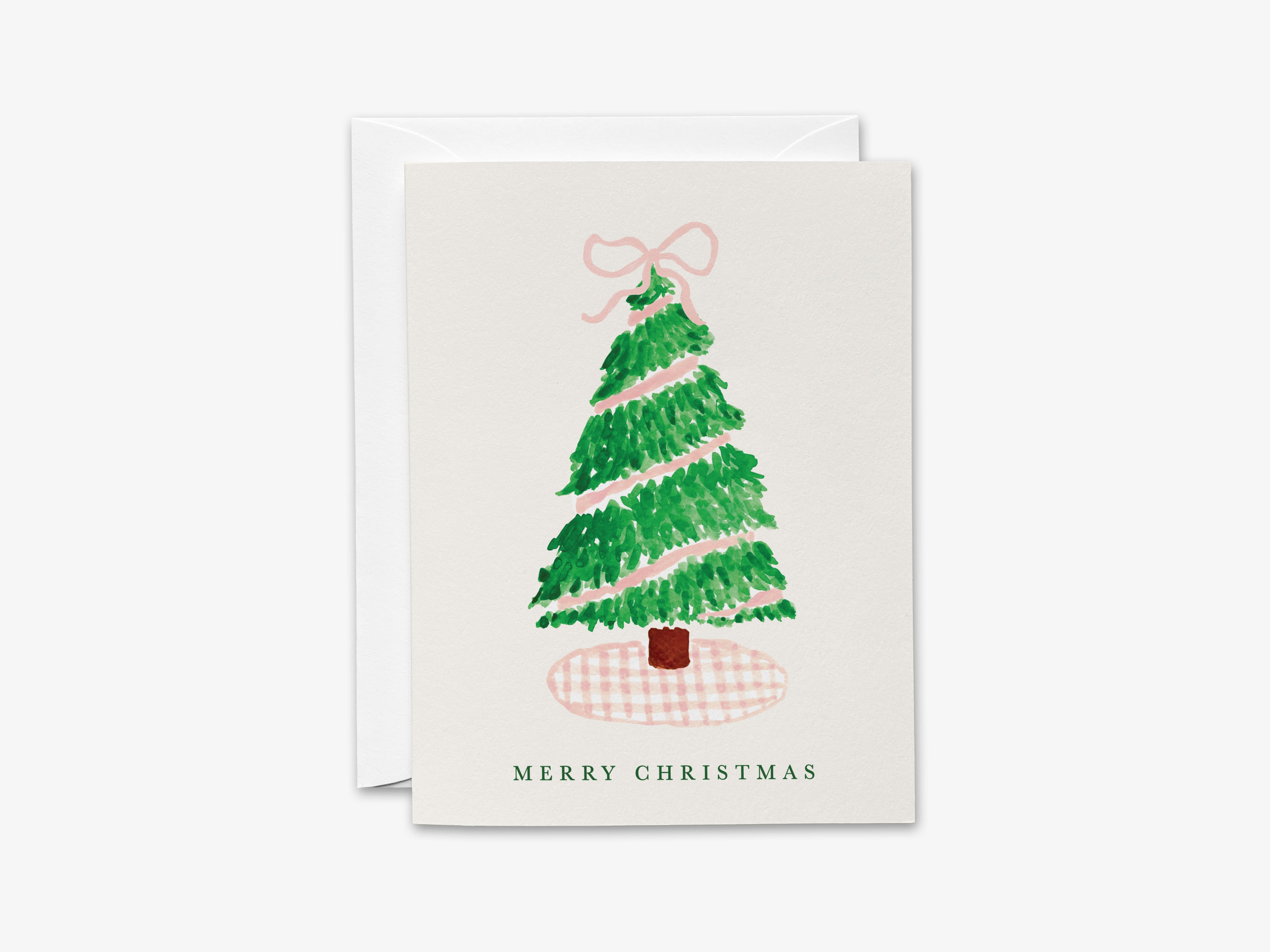 A Christmas card with a green tree illustration and a pink bow on top.