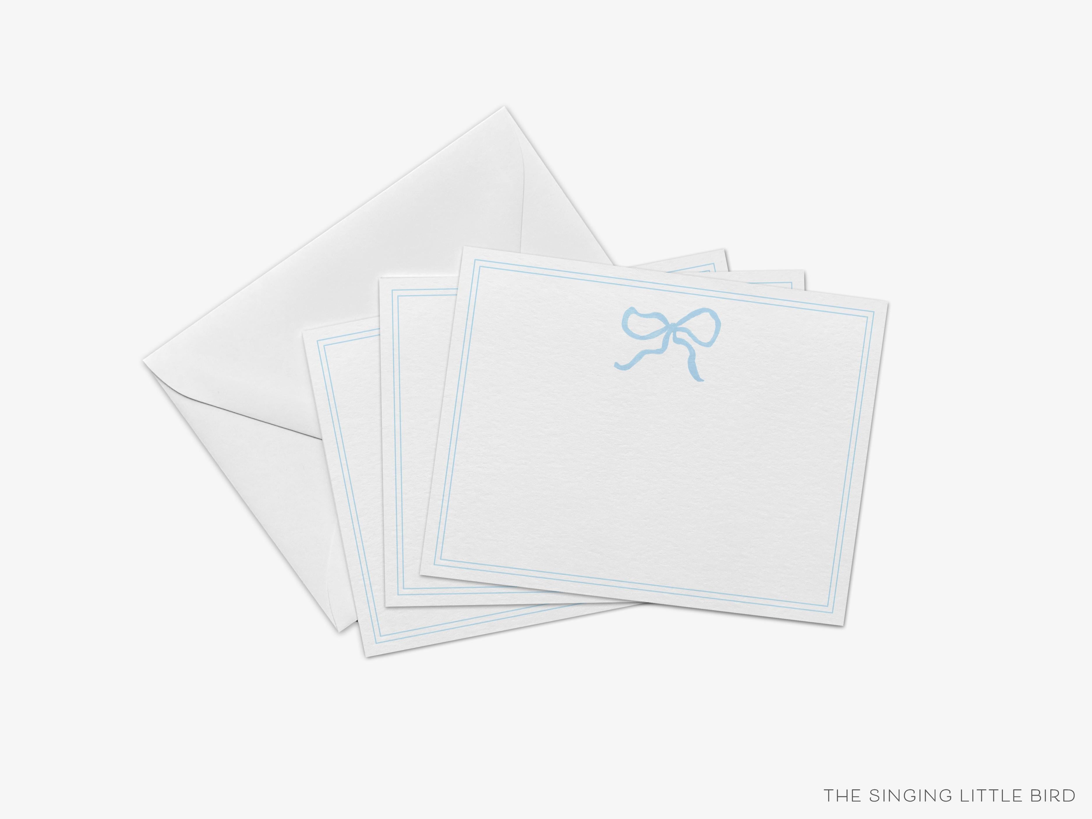 Light Blue Bow Flat Notes [Sets of 8]-These flat notecards are 4.25x5.5 and feature our hand-painted watercolor bow, printed in the USA on 120lb textured stock. They come with white envelopes and make great thank yous and gifts for the bow lover in your life.-The Singing Little Bird